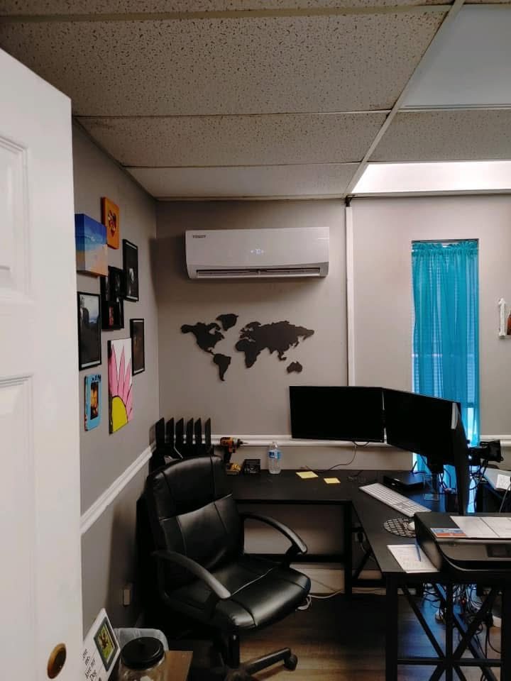 Wall-mounted ductless mini-split head unit installed cleanly in a Calhoun, GA office