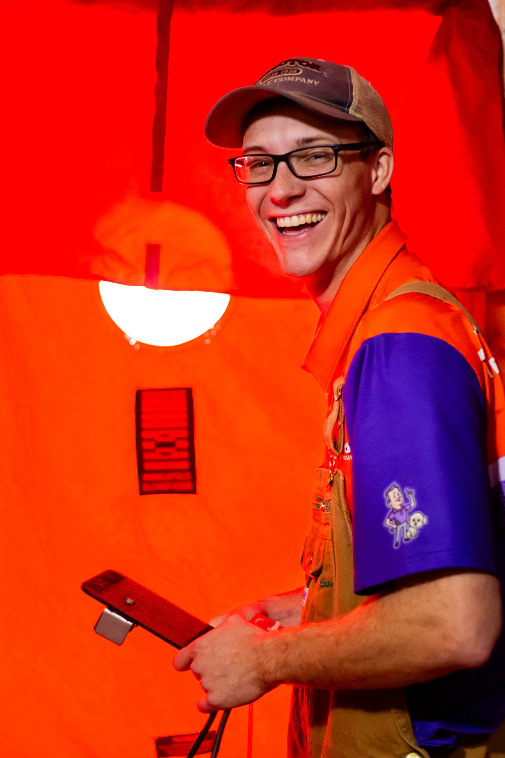 Anderson Heating, Air & Insulation BPI-certified technician performing a Minneapolis Blower Door test in a Northwest Georgia home — the signature scientific diagnostic that measures whole-house air leakage and proves BPI-certified work.