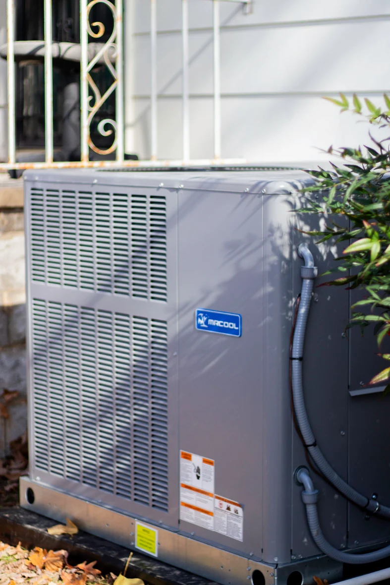Outdoor HVAC unit installed beside a home